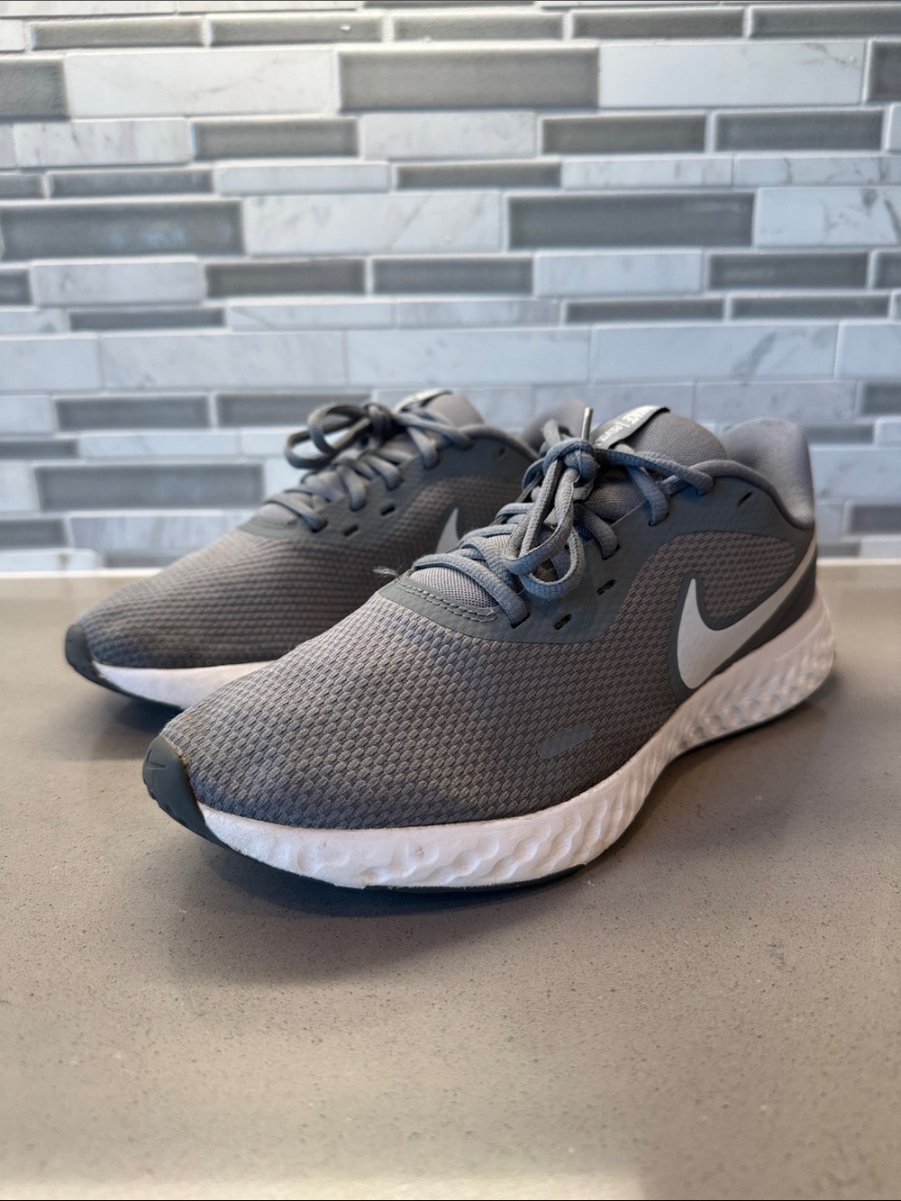 Nike Revolution Men's Gray and White Athletic Running Shoes